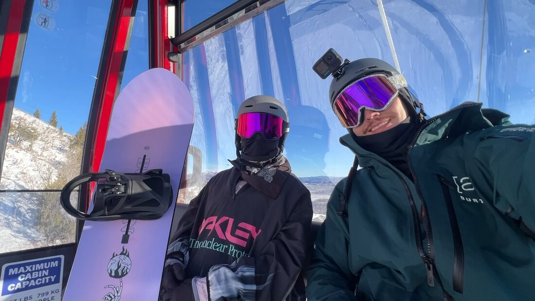 Katrina and Matthew in a gondola on a snowboarding trip